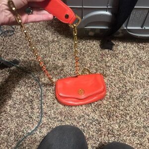 Tory Burch Vibrant Orange Mini Bag with detachable chain strap.
